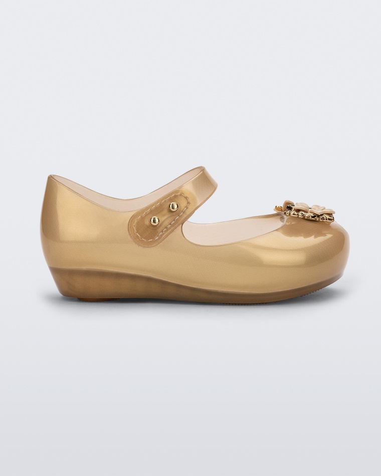 melissa_mini_ultragirl_chrome_flower_baby_gold.jpg Melissa Mini Ultragirl Chrome Flower Baby Gold - Image 1
